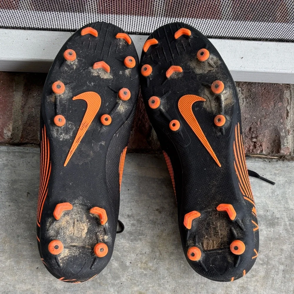 Nike Men’s Mercurial Soccer Cleats Black and Orange - size 9.5